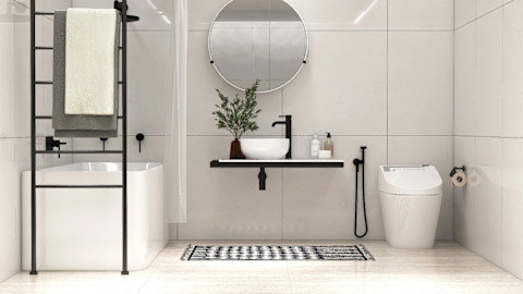 Minimalistische moderne badkamer met witte tegels en strakke, luxe uitstraling.
