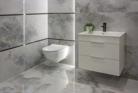 Afbeelding van een chique toiletruimte met luxe wc tegels als inspiratie