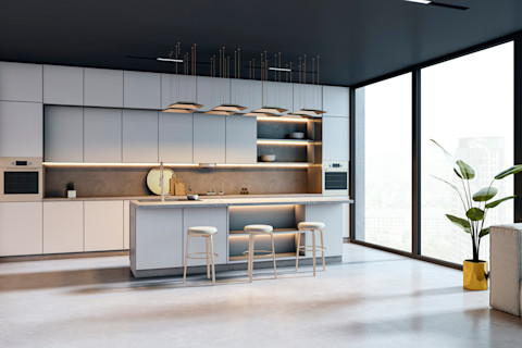 Moderne keuken met strakke kasten en een nette gietvloer in betonlook