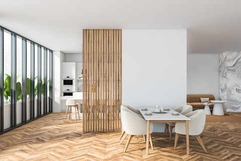 Een stijlvolle houten constructie die de ruimte visueel verdeelt en tegelijkertijd functioneert als open opbergrek—perfect voor een lichte scheidingswand met opslagoptie.
