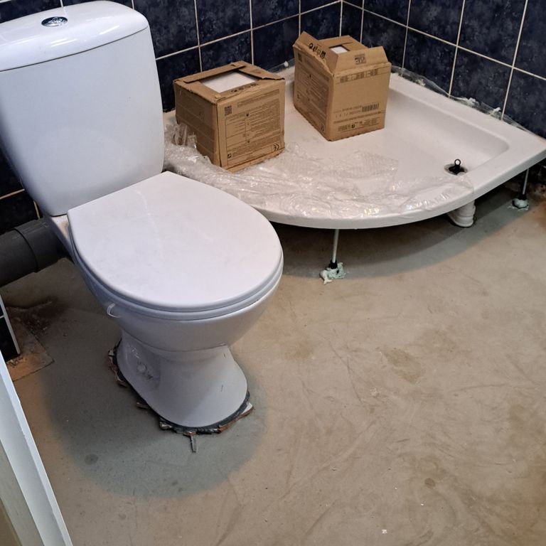 Repareren: douche cabine plaatsen