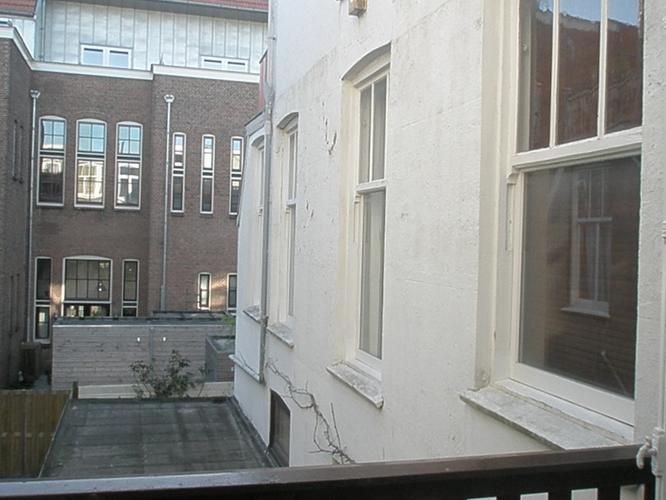 buitenmuur en kozijnen verven