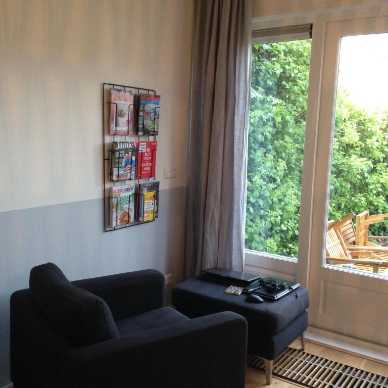 Schilderen halve muur woonkamer
