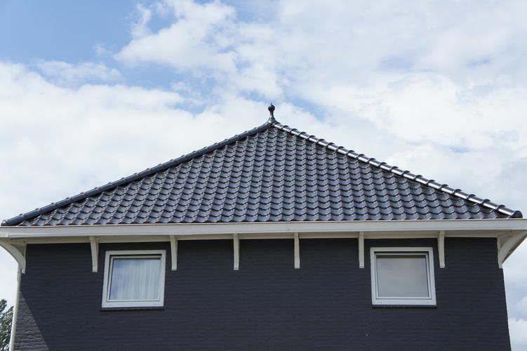 dakpannen en dakbeschot vervangen