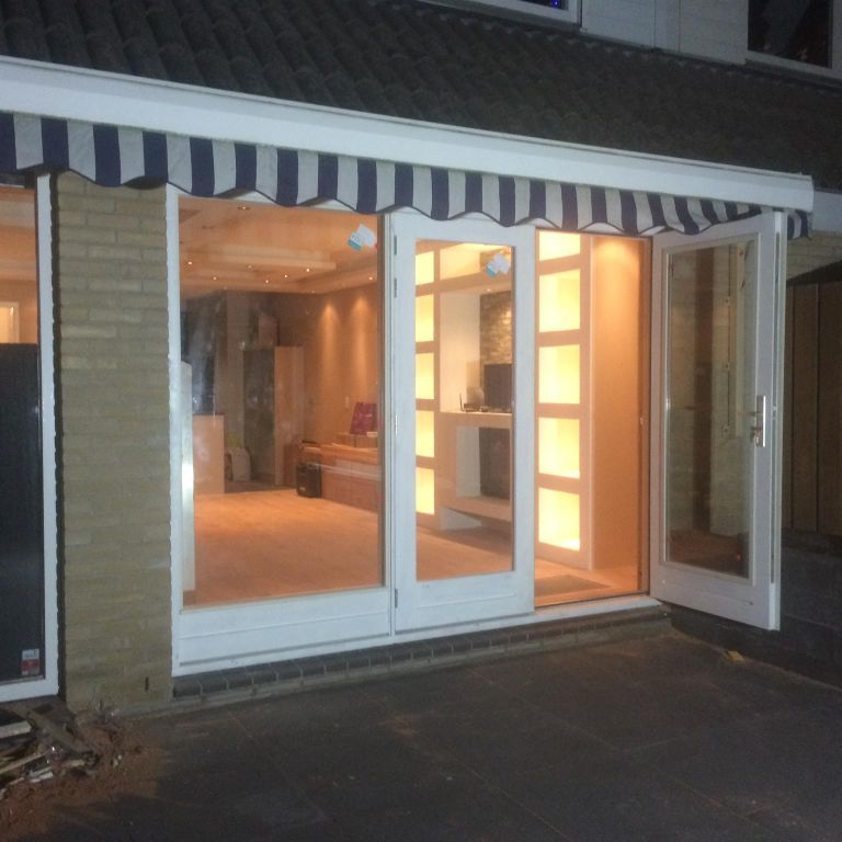 Vervangen van schuifpui, inmeten en plaatsen nieuwe openslaande tui...