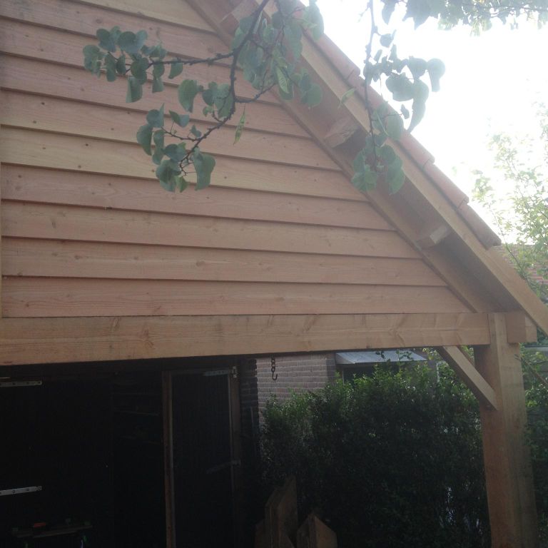 zadeldak op dubbele garagebox bouwen