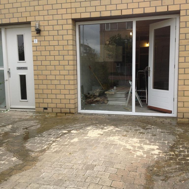 plaatsen pui (deur en raam) in garageopening