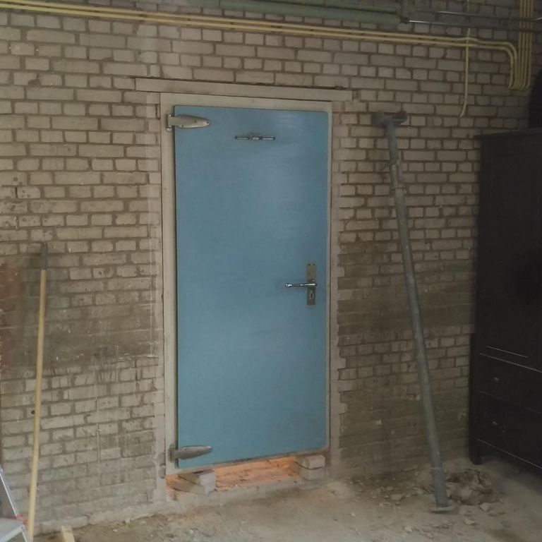 Doorgang maken in een draagmuur tussen garage en gang van woongedeelte