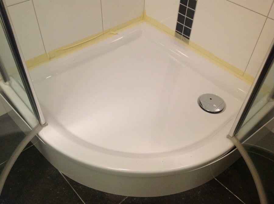 Douchebak opnieuw stellen en afkitten Werkspot