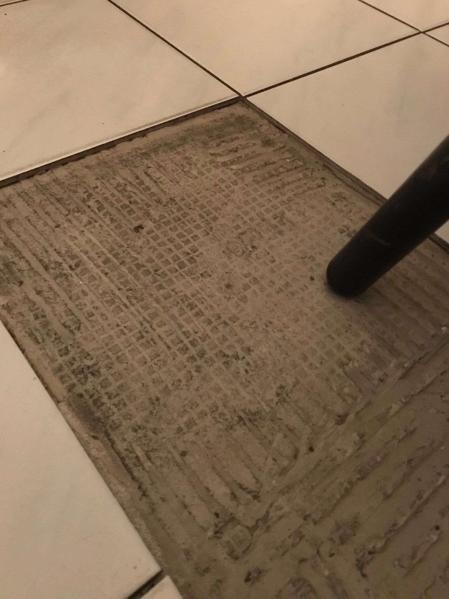 Verwijderen tegelvloer en egaliseren 21 m2 Werkspot