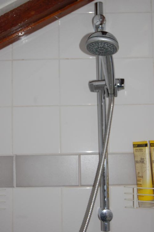 Opnieuw kitten van douchebak Werkspot