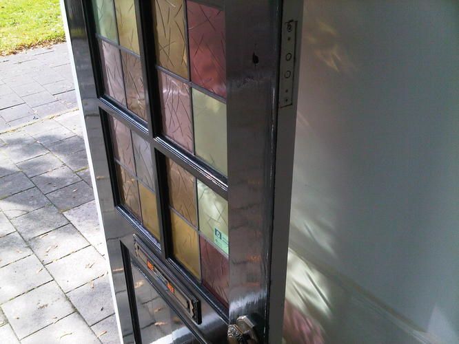 Extra slot op voordeur + plaatsen kattenluik Werkspot