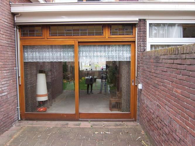 2* achterpui met openslaande deuren Werkspot