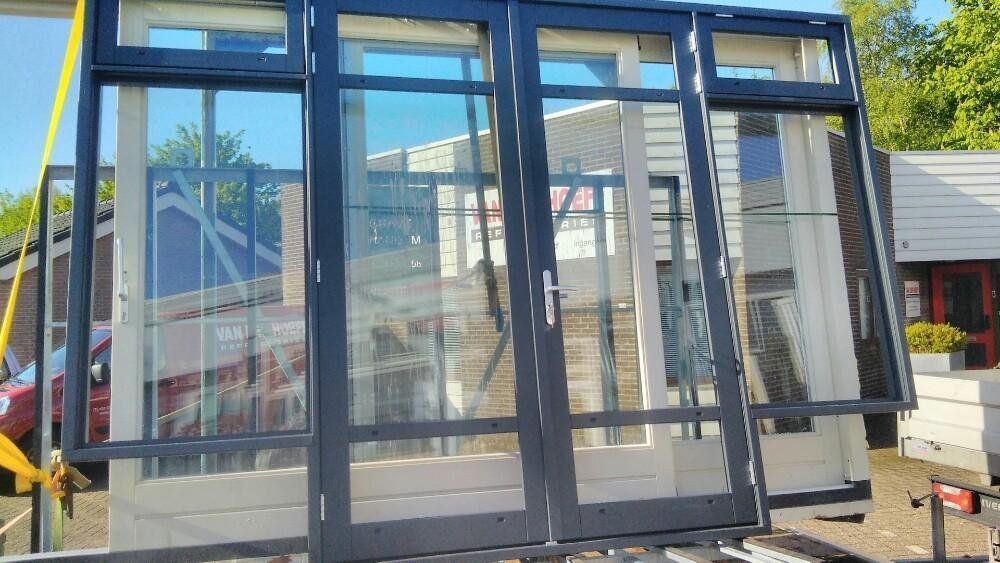 Plaatsen nieuwe achter pui (melkmeisje) met openslaande deuren Werkspot