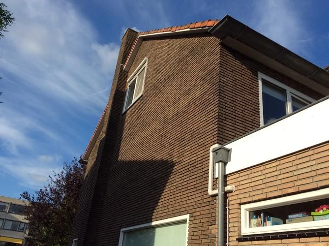 Oude voegen verwijderen en opnieuw voegen buitenmuur Werkspot