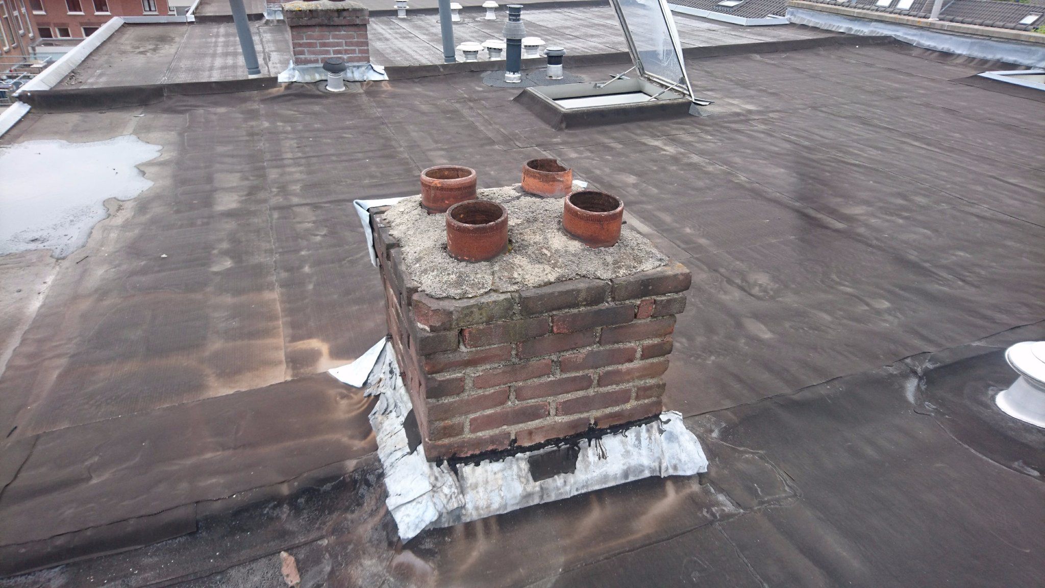 Schoorsteen waterdicht maken Werkspot