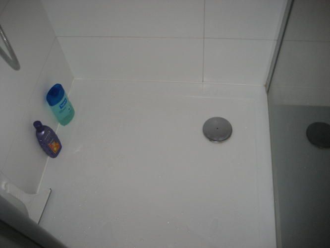 Opnieuw kitten douchebak van douchecabine Werkspot