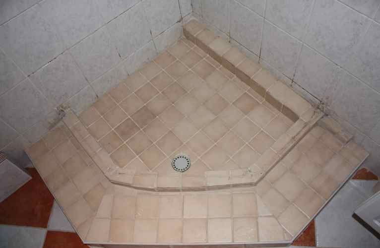 betegelen douchebodem Werkspot