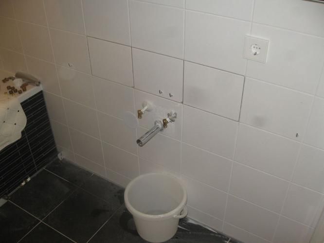 Aansluiten aan en afvoer dubbele wastafel Werkspot