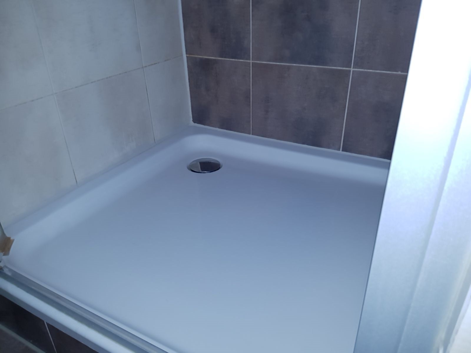 Douchecabine kitnaad vervangen Werkspot