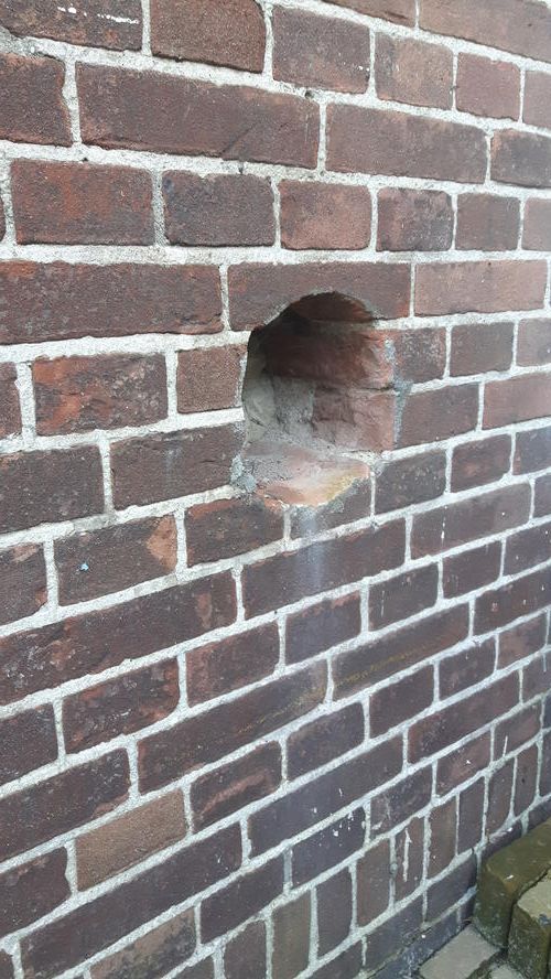 Herstel gat buitenmuur/dichten van 2 gaten (kachel afvoer) in buite... Werkspot