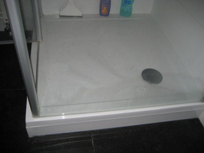 Opnieuw kitten douchebak van douchecabine Werkspot