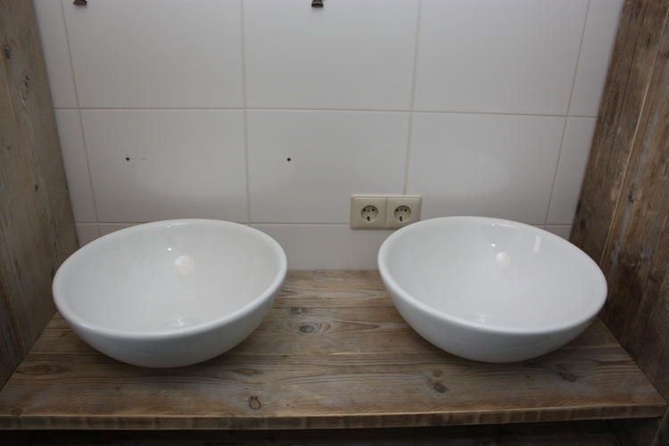 Aansluiten dubbele wastafelkraan + afvoer Werkspot