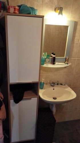 Beige tegels badkamer