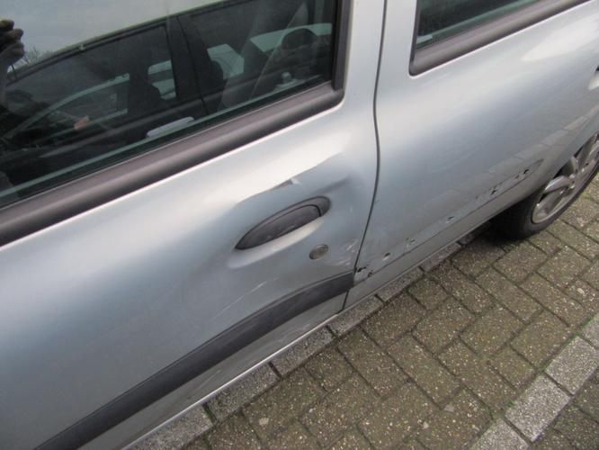 Repareren auto deur Werkspot