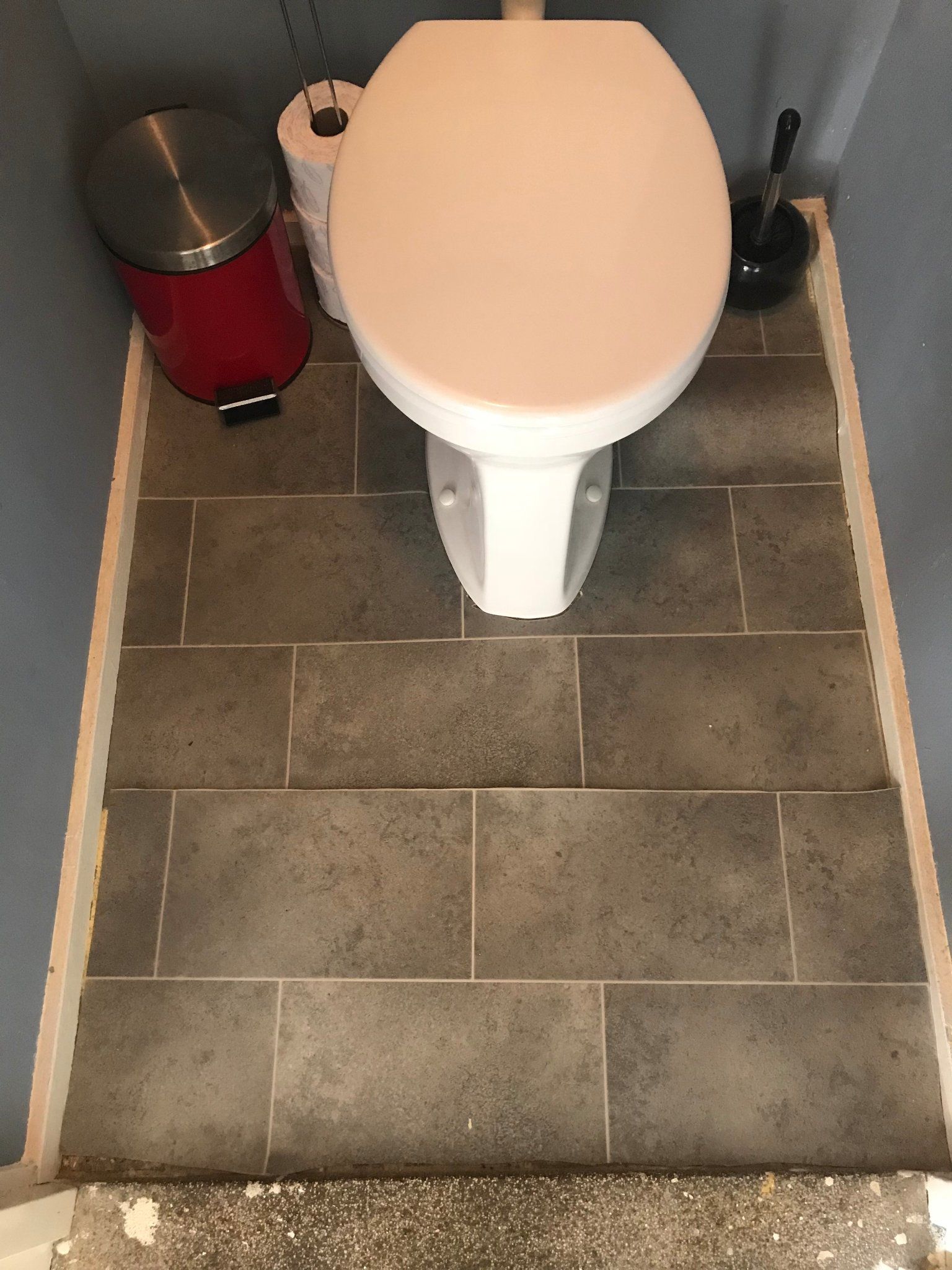 Vloer leggen toilet (zeil, vinyl, pvc)