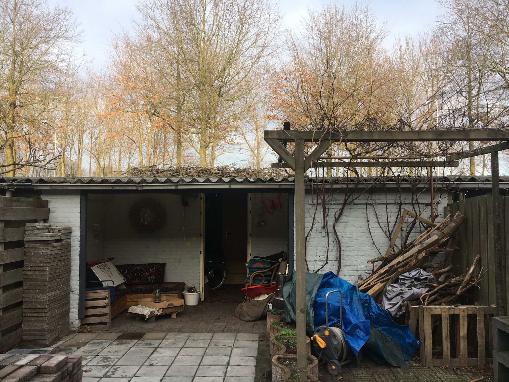 Schuur verhogen en plat dak maken (afdak) Werkspot
