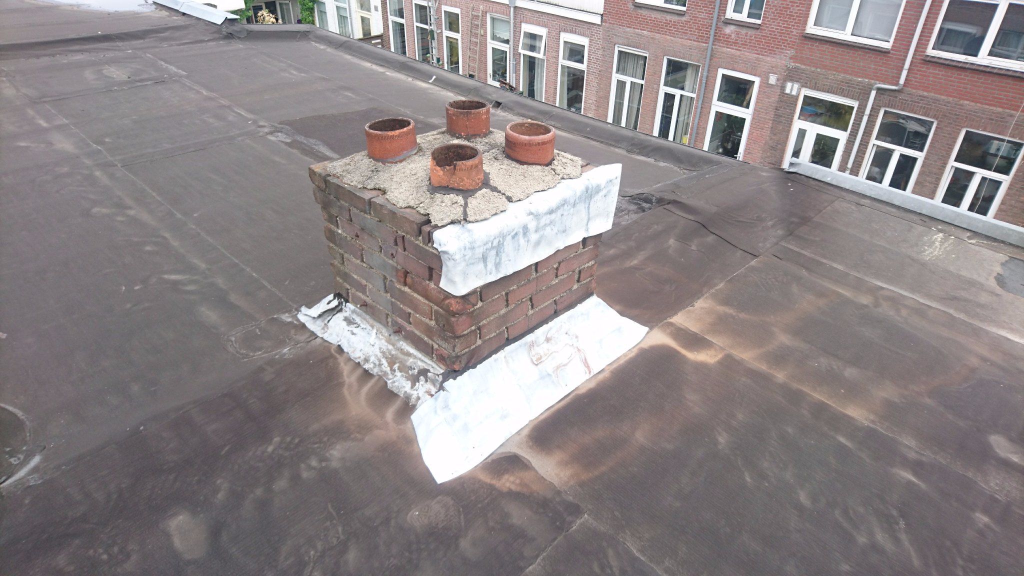 Schoorsteen waterdicht maken Werkspot