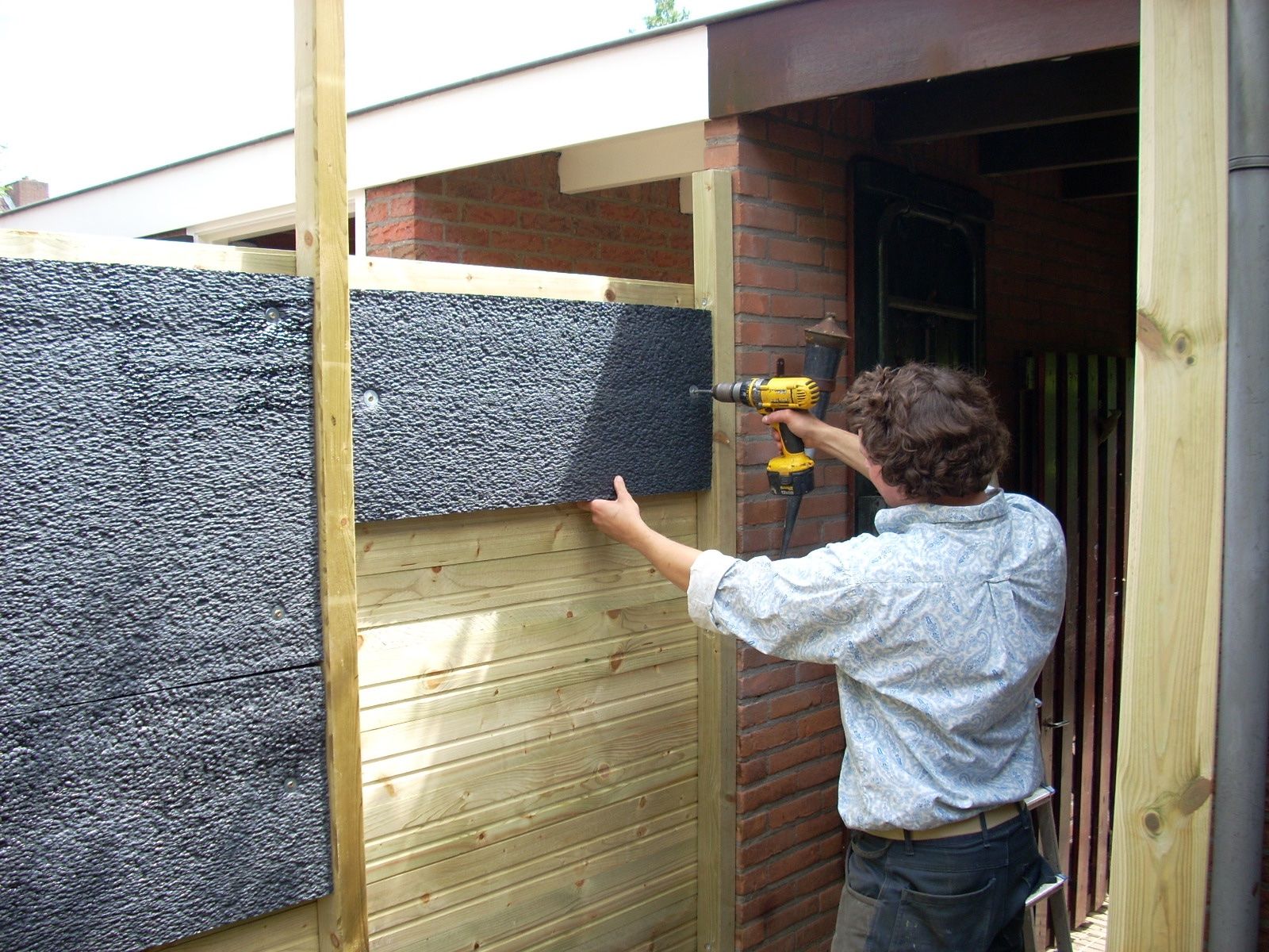 Plaatsen schutting L3, H3 Hout/Kokos Geluidsabsorberen + Afdakje Werkspot