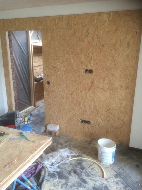 Osb platen behangen woonunit Werkspot