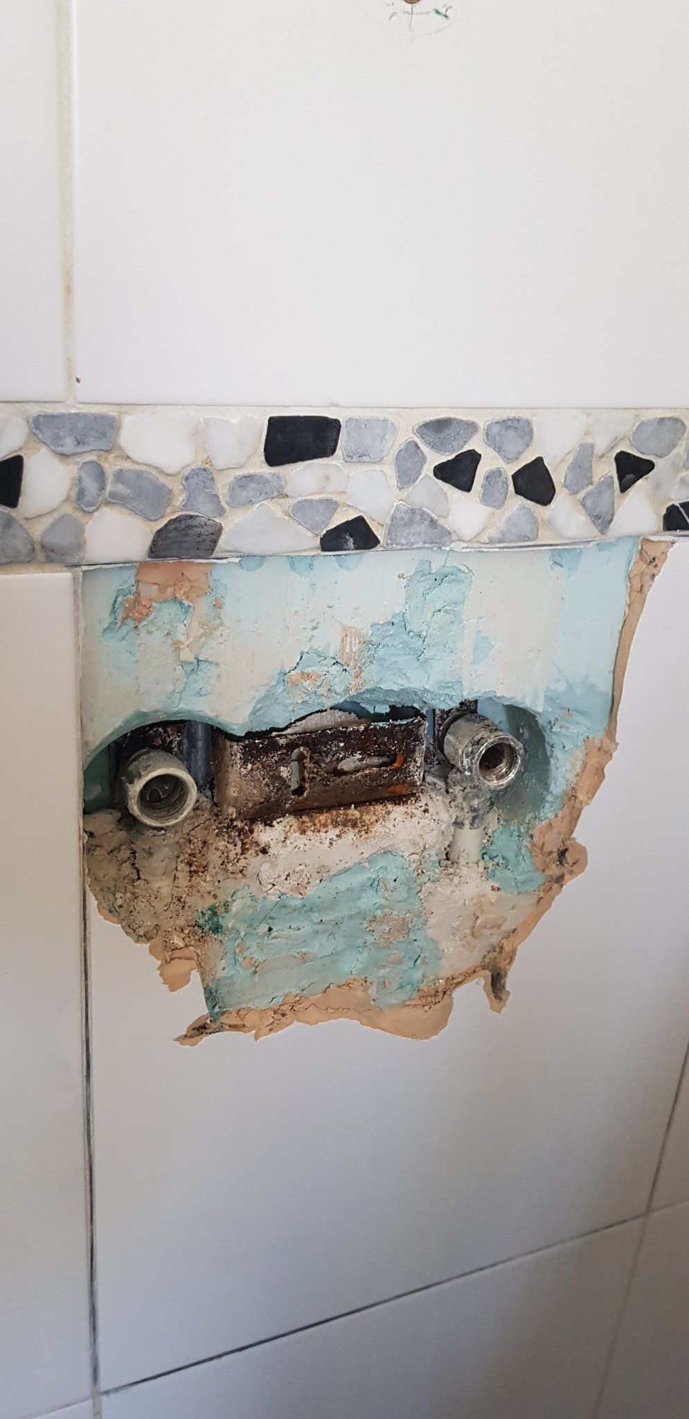 Badkamer; Muurplaat van de douchekraan vervangen Werkspot